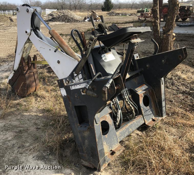 image for item DC0185 Melroe 709 skid steer backhoe attachment