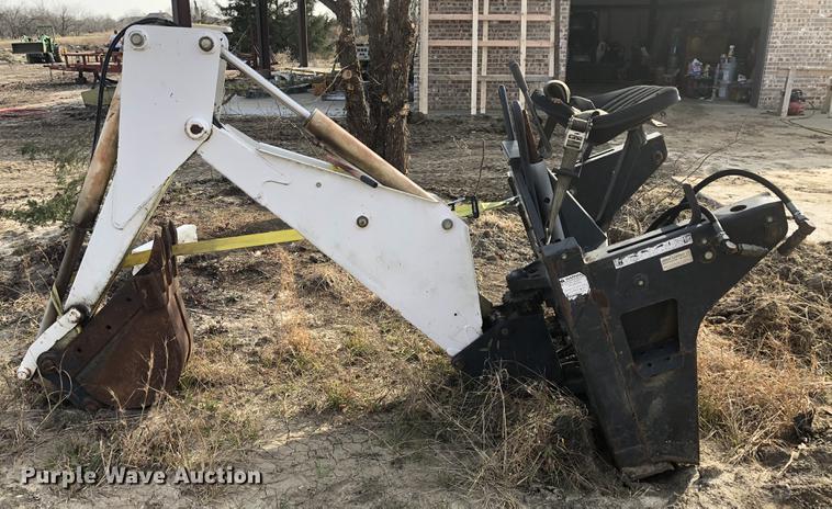 image for item DC0185 Melroe 709 skid steer backhoe attachment