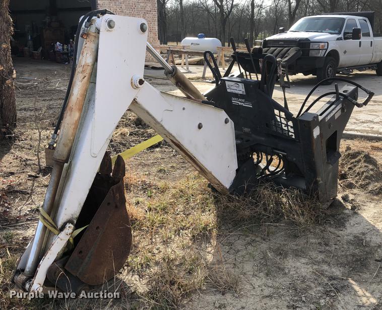 image for item DC0185 Melroe 709 skid steer backhoe attachment