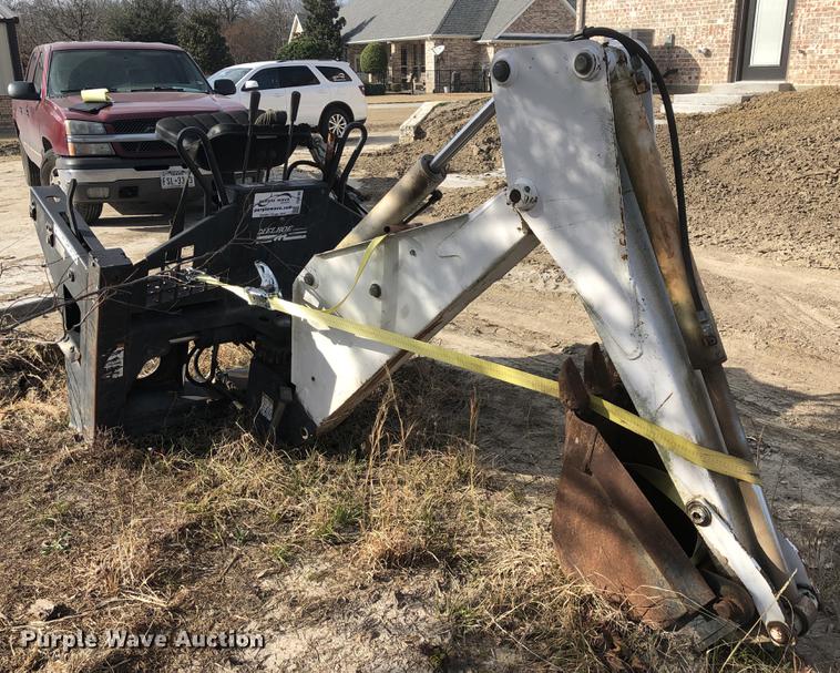 image for item DC0185 Melroe 709 skid steer backhoe attachment