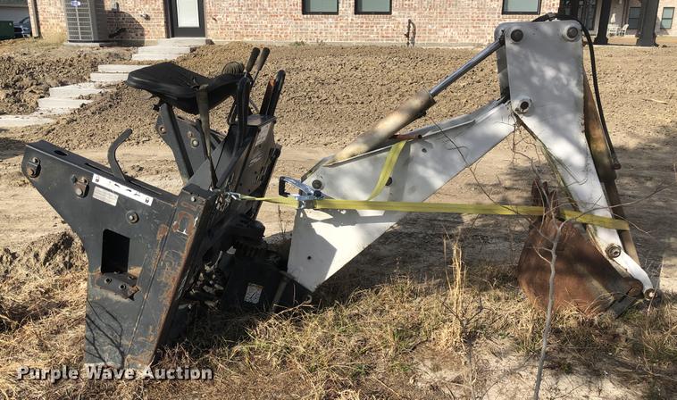 image for item DC0185 Melroe 709 skid steer backhoe attachment