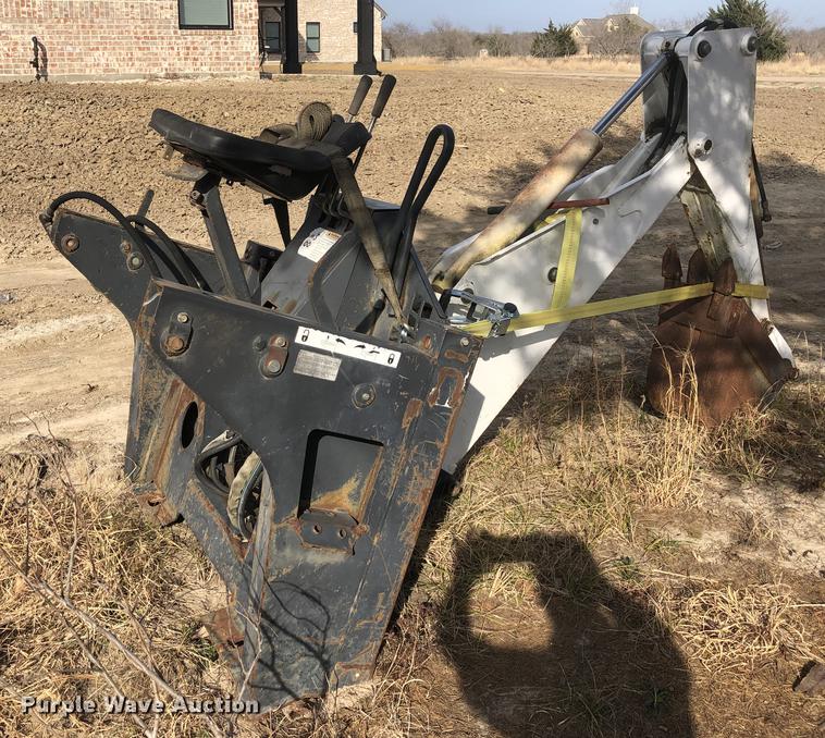 image for item DC0185 Melroe 709 skid steer backhoe attachment