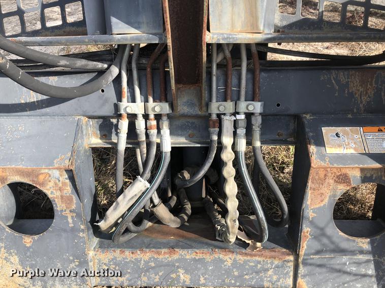 image for item DC0185 Melroe 709 skid steer backhoe attachment