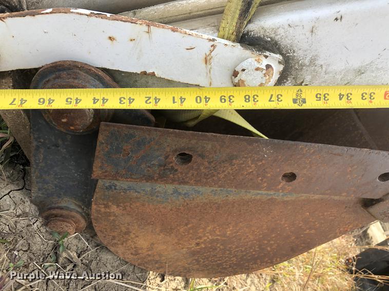 image for item DC0185 Melroe 709 skid steer backhoe attachment