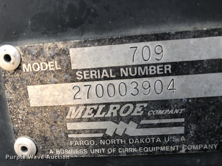 image for item DC0185 Melroe 709 skid steer backhoe attachment