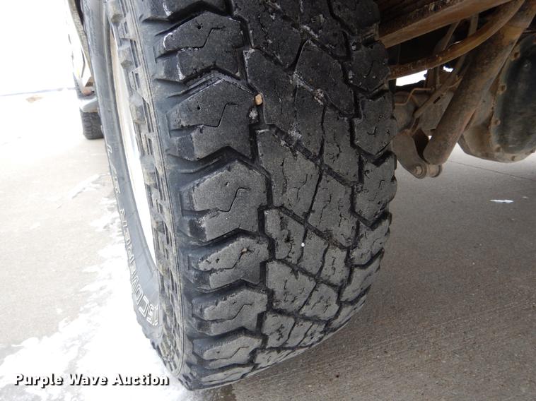 image for item DE5985 2002 Ford F250 Super Duty Lariat SuperCab utility bed pickup truck