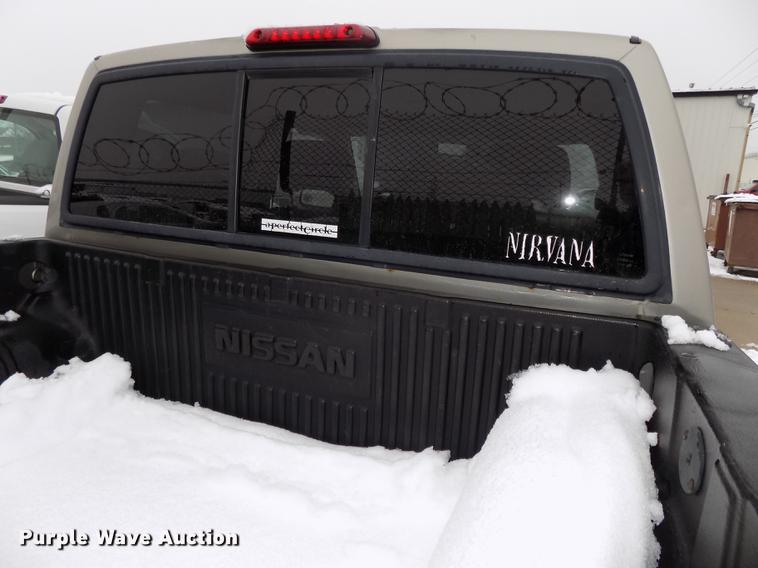 image for item DE7559 2000 Nissan Frontier Crew Cab pickup truck