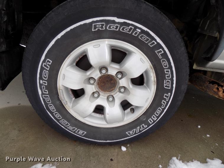 image for item DE7559 2000 Nissan Frontier Crew Cab pickup truck