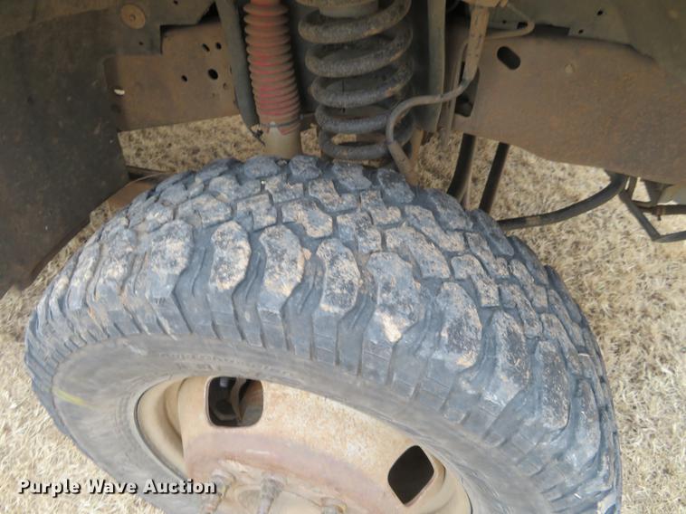 image for item DE8792 2007 Ford F350 Super Duty flatbed pickup truck