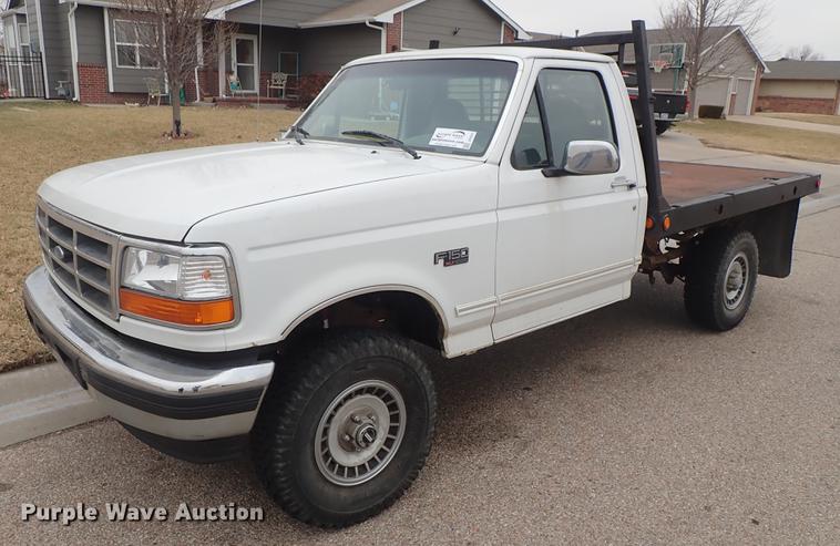 image for item DF8721 1996 Ford F150 flatbed pickup truck