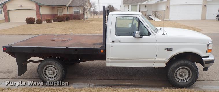 image for item DF8721 1996 Ford F150 flatbed pickup truck