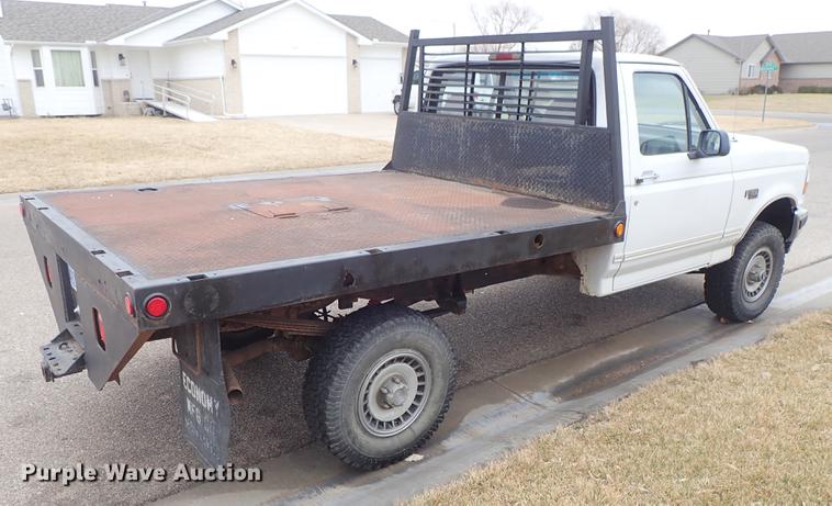 image for item DF8721 1996 Ford F150 flatbed pickup truck
