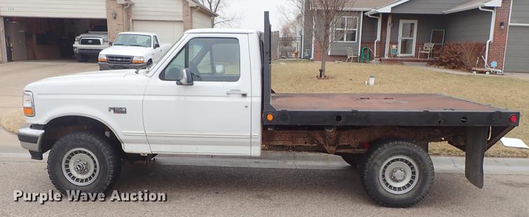 image for item DF8721 1996 Ford F150 flatbed pickup truck
