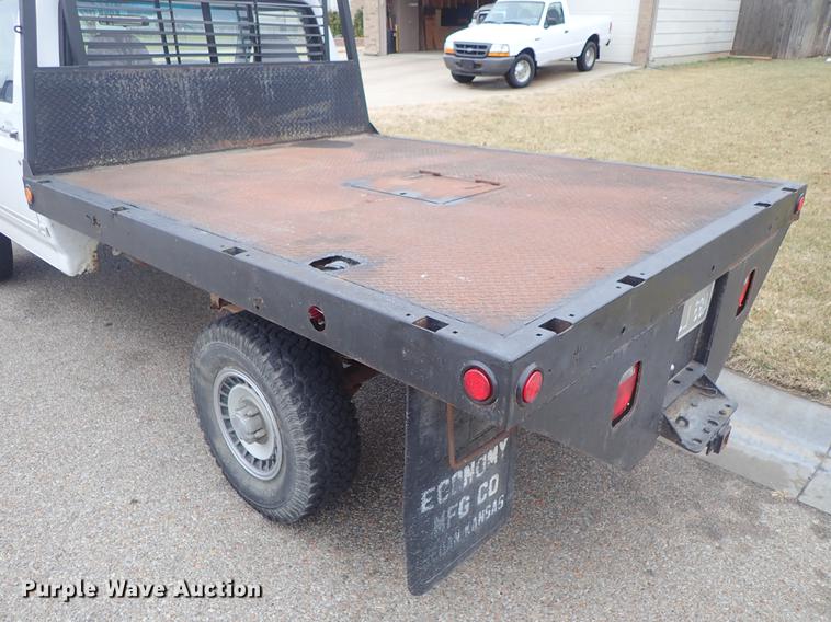 image for item DF8721 1996 Ford F150 flatbed pickup truck