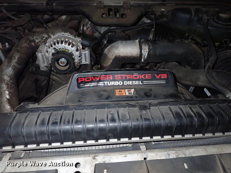 image for item DF8732 2005 Ford F350 Super Duty Crew Cab utility bed pickup truck