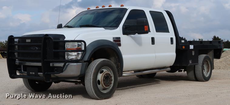 image for item DG3337 2008 Ford F550 XL Super Duty Crew Cab flatbed pickup truck