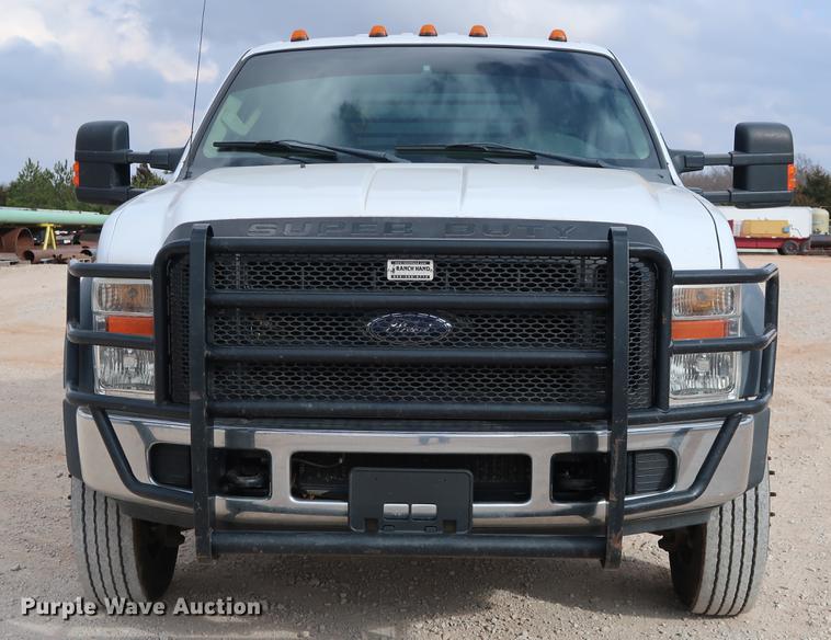 image for item DG3337 2008 Ford F550 XL Super Duty Crew Cab flatbed pickup truck