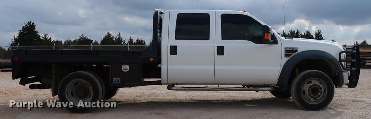 image for item DG3337 2008 Ford F550 XL Super Duty Crew Cab flatbed pickup truck