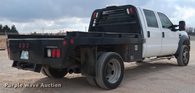 image for item DG3337 2008 Ford F550 XL Super Duty Crew Cab flatbed pickup truck