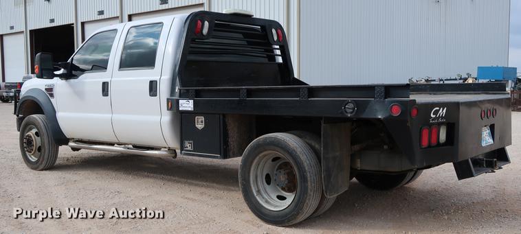 image for item DG3337 2008 Ford F550 XL Super Duty Crew Cab flatbed pickup truck