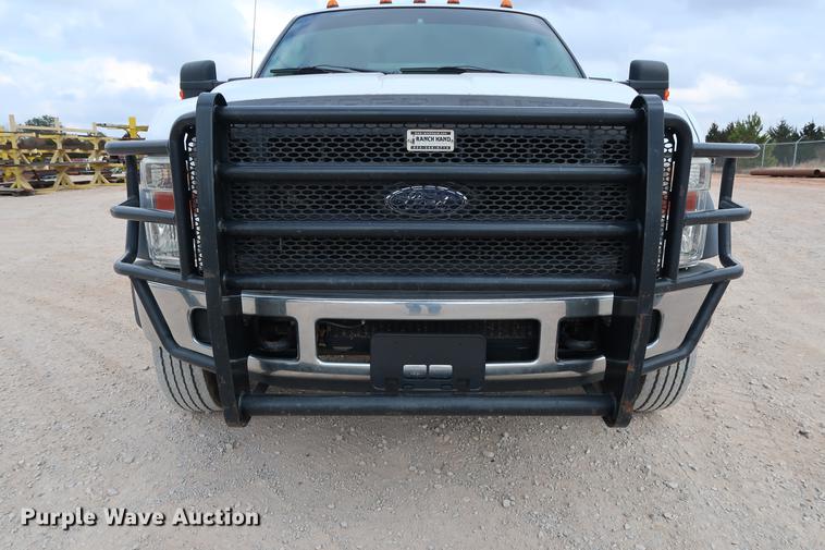 image for item DG3337 2008 Ford F550 XL Super Duty Crew Cab flatbed pickup truck