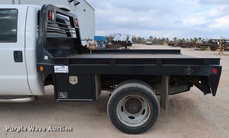 image for item DG3337 2008 Ford F550 XL Super Duty Crew Cab flatbed pickup truck