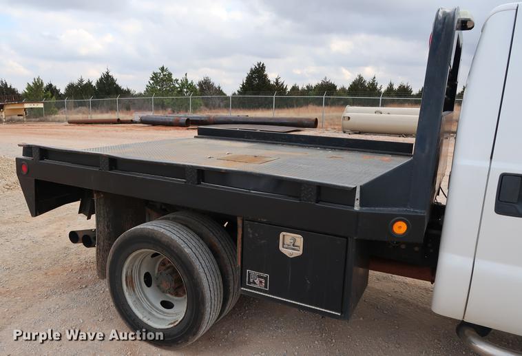 image for item DG3337 2008 Ford F550 XL Super Duty Crew Cab flatbed pickup truck