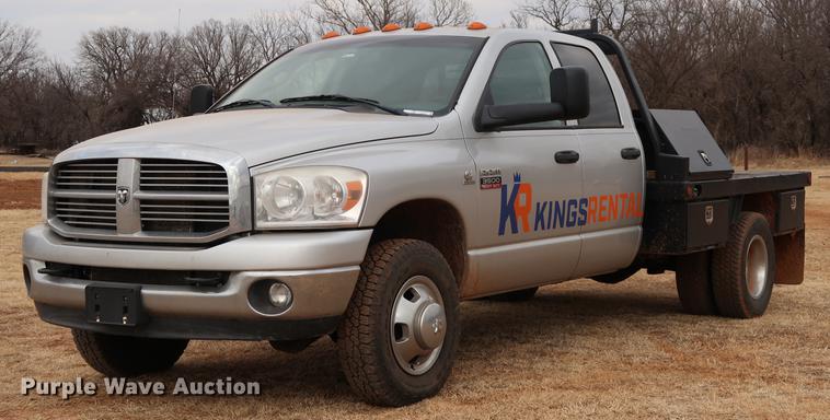 image for item FI9759 2009 Dodge Ram 3500HD Big Horn Edition Quad Cab flatbed pickup truck