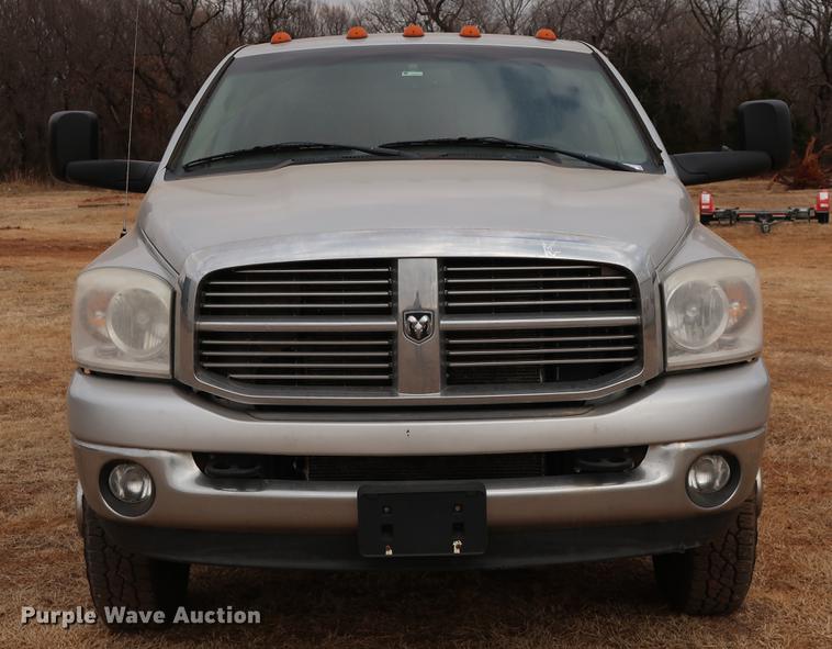 image for item FI9759 2009 Dodge Ram 3500HD Big Horn Edition Quad Cab flatbed pickup truck