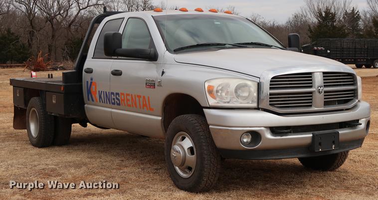image for item FI9759 2009 Dodge Ram 3500HD Big Horn Edition Quad Cab flatbed pickup truck