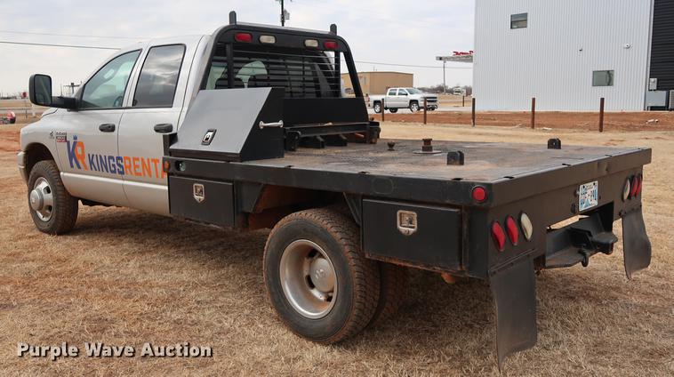image for item FI9759 2009 Dodge Ram 3500HD Big Horn Edition Quad Cab flatbed pickup truck