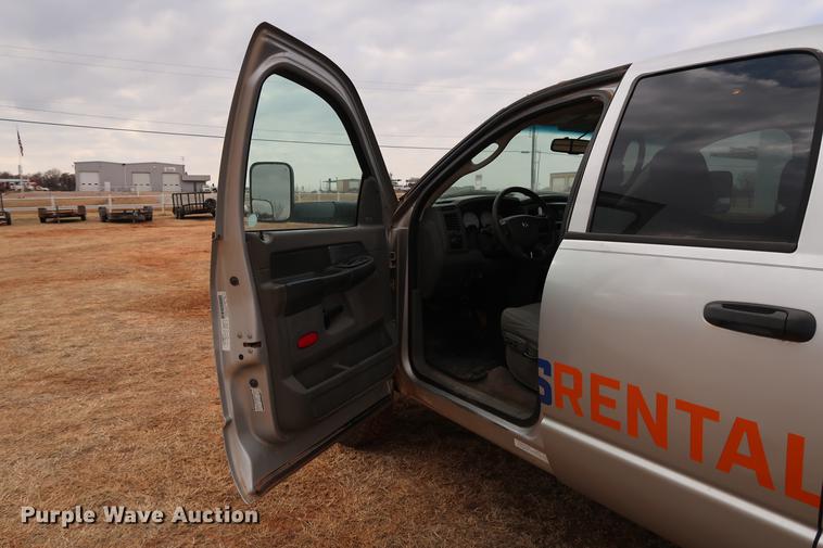 image for item FI9759 2009 Dodge Ram 3500HD Big Horn Edition Quad Cab flatbed pickup truck