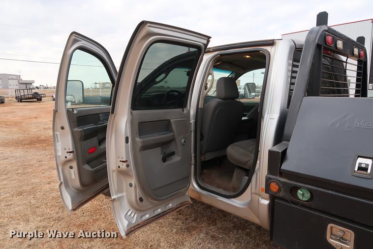 image for item FI9759 2009 Dodge Ram 3500HD Big Horn Edition Quad Cab flatbed pickup truck