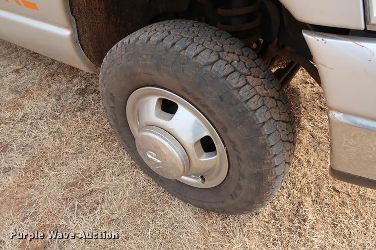 image for item FI9759 2009 Dodge Ram 3500HD Big Horn Edition Quad Cab flatbed pickup truck