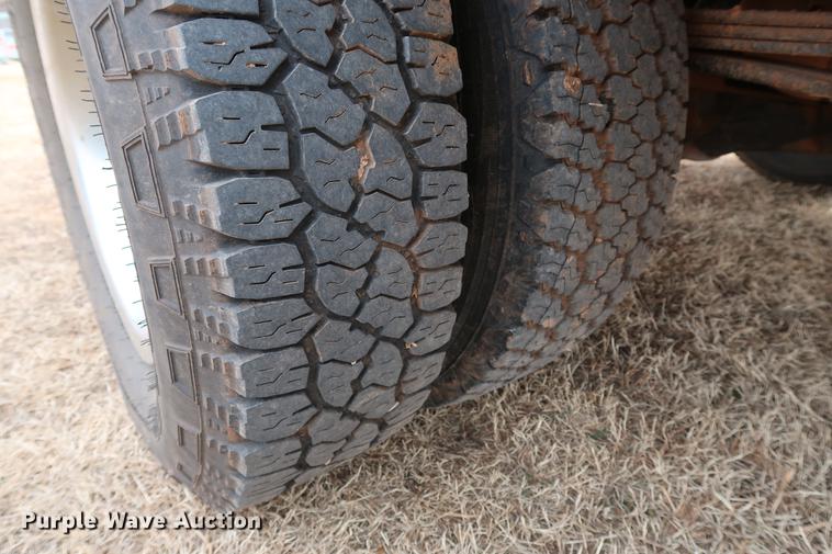 image for item FI9759 2009 Dodge Ram 3500HD Big Horn Edition Quad Cab flatbed pickup truck