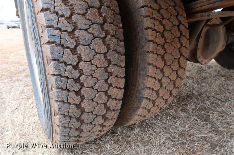 image for item FI9759 2009 Dodge Ram 3500HD Big Horn Edition Quad Cab flatbed pickup truck