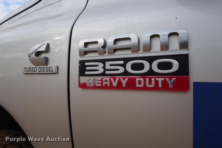 image for item FI9759 2009 Dodge Ram 3500HD Big Horn Edition Quad Cab flatbed pickup truck