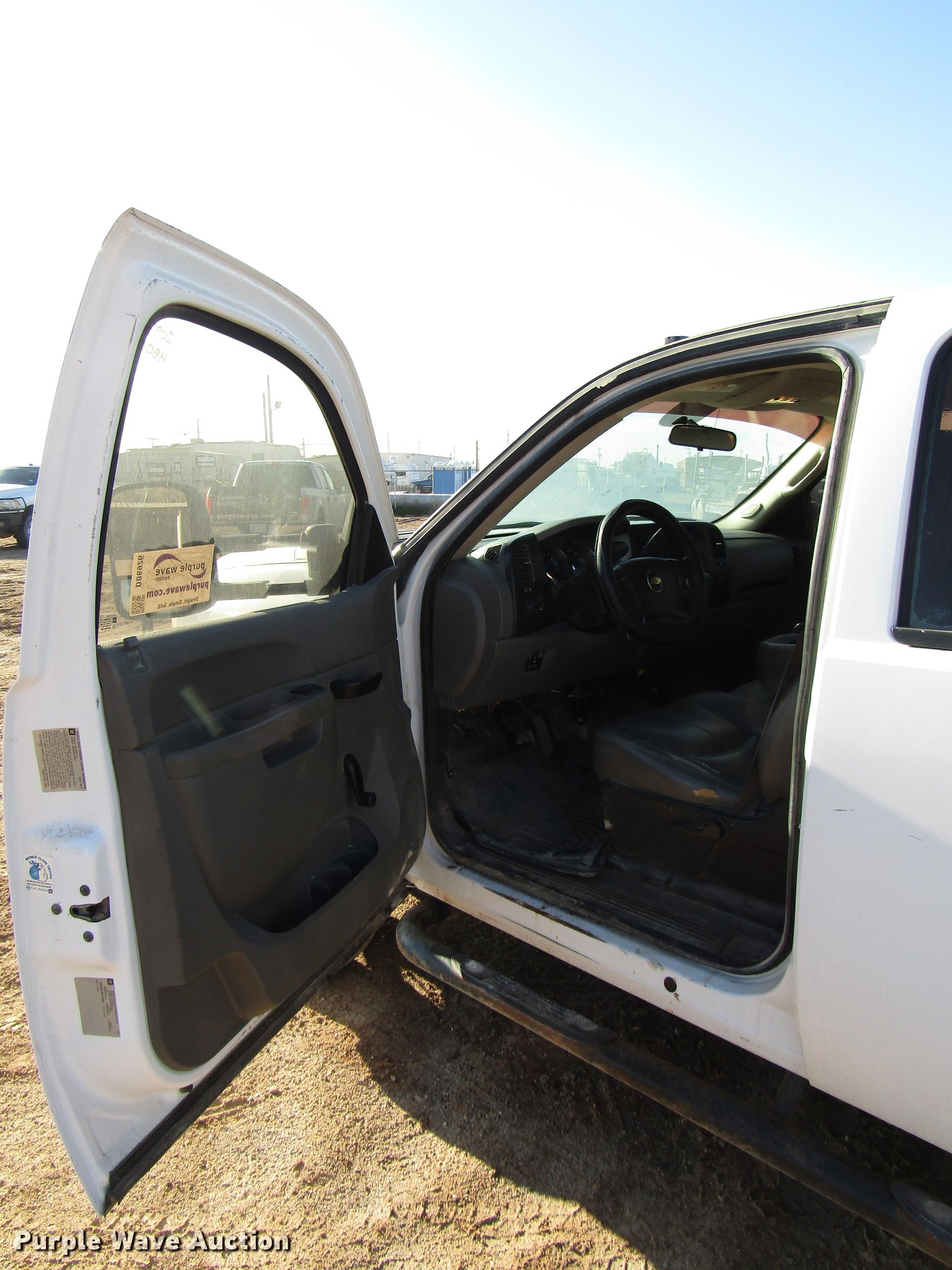 2011 Chevrolet Silverado 3500HD Crew Cab flatbed pickup truck in Pecos