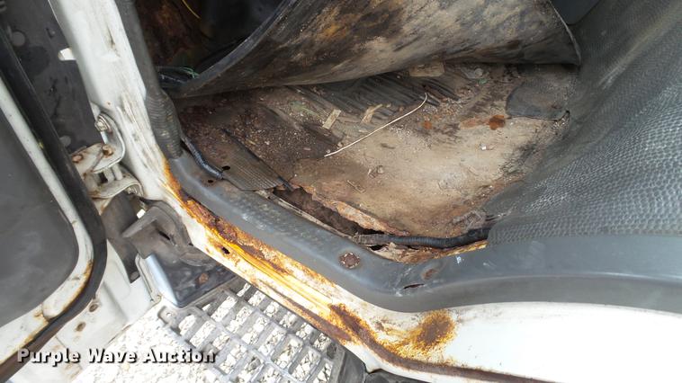 image for item DE4950 2002 Isuzu NPC7SC dump truck