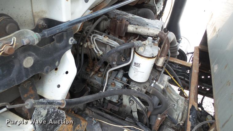 image for item DE4950 2002 Isuzu NPC7SC dump truck