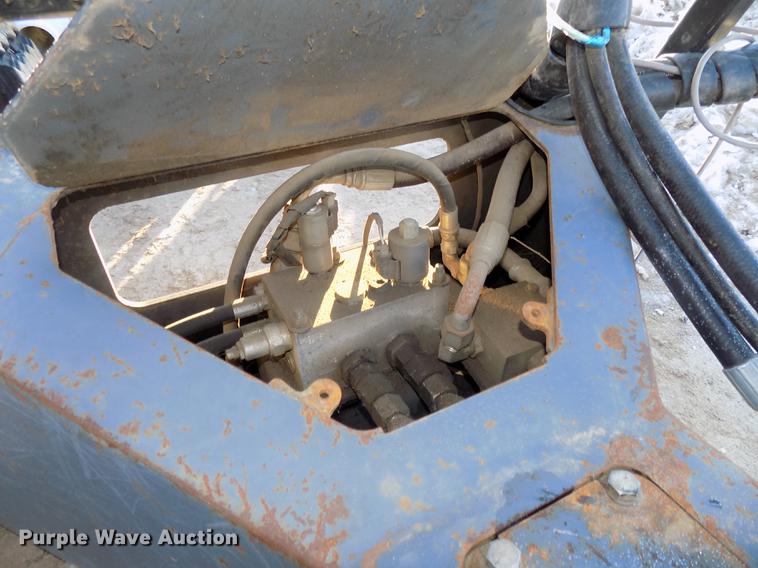 image for item DE7578 2014 Bobcat Landshark TTS12UN skid steer tree saw