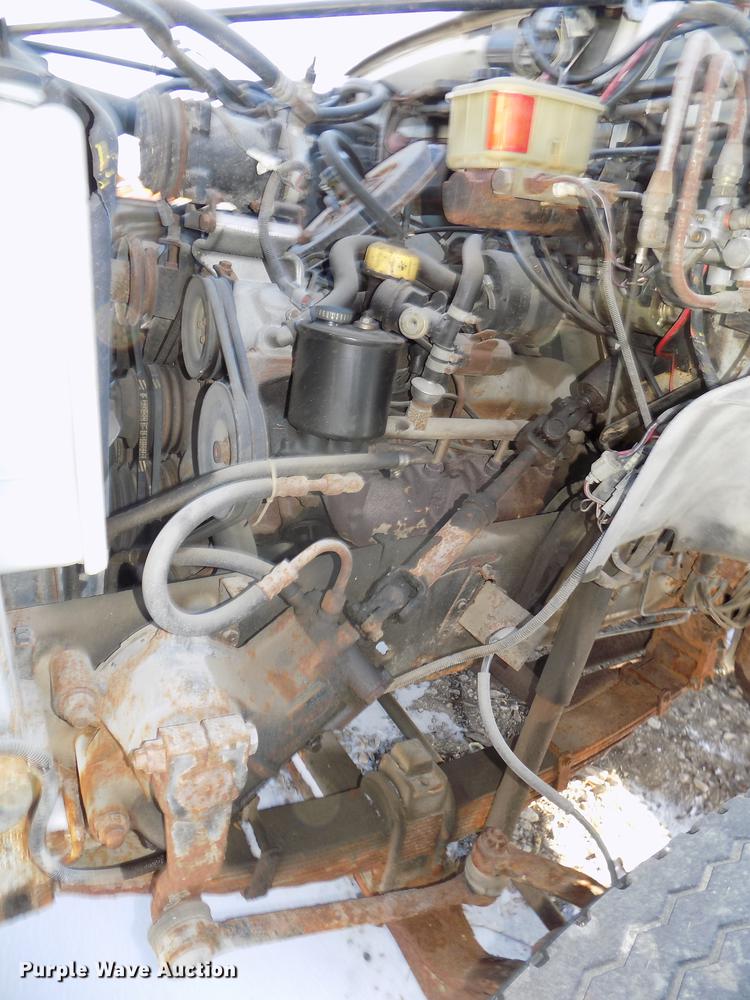 image for item DE7603 1989 Ford F700 spreader truck