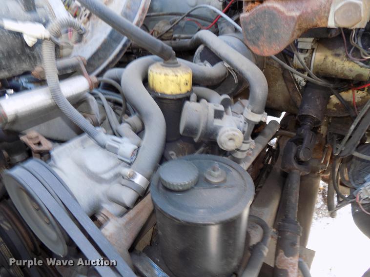 image for item DE7603 1989 Ford F700 spreader truck