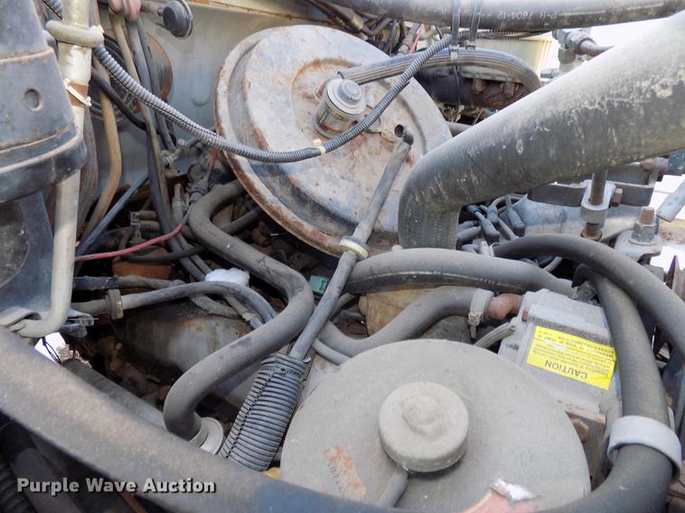 image for item DE7603 1989 Ford F700 spreader truck