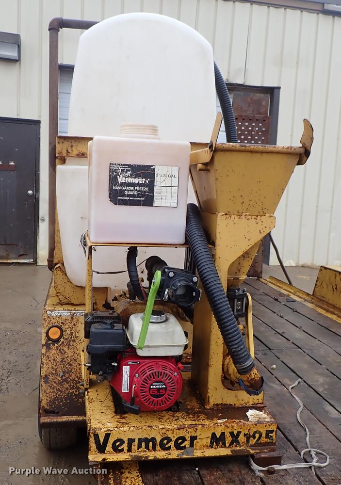 image for item DF8736 2014 Vermeer D9x13 S3 directional drill, mud mixing system, and trailer