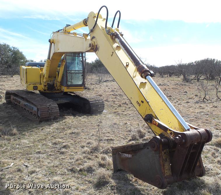 image for item EN9701 2002 New Holland EC215 excavator