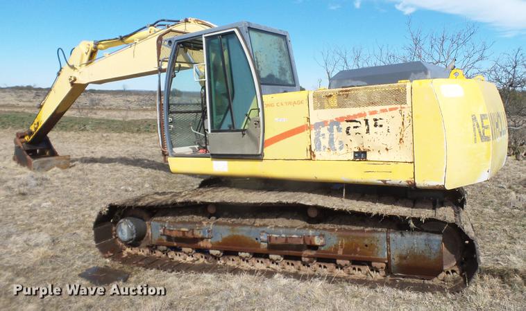 image for item EN9701 2002 New Holland EC215 excavator