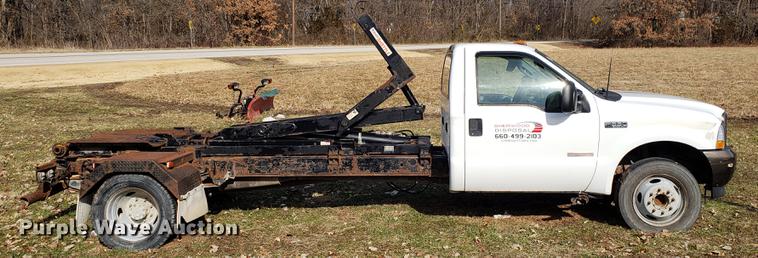 image for item EN9755 2003 Ford F550 roll-off container truck