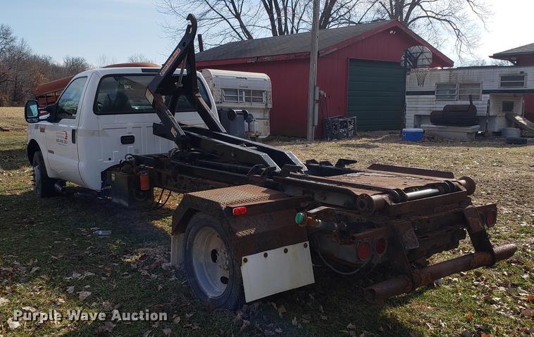 image for item EN9755 2003 Ford F550 roll-off container truck