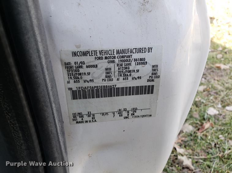 image for item EN9755 2003 Ford F550 roll-off container truck